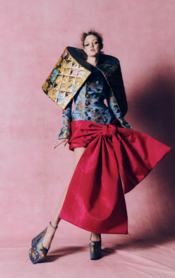 a model wearing a design from the Harris Reed AW26 collection