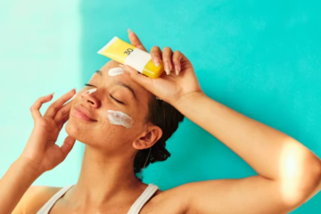 a model holding a sunscreen