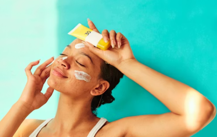 a model holding a sunscreen