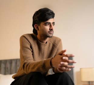 a man sitting and thinking