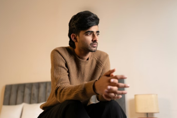 a man sitting and thinking