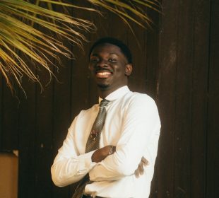 a male model standing confidently