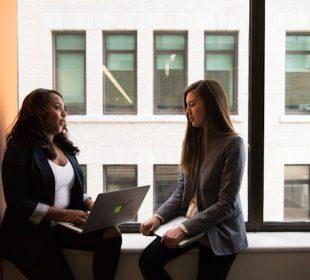 two successful women working together