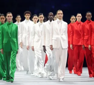 a picture of models on the Armani suit at the winter olympics opening ceremony